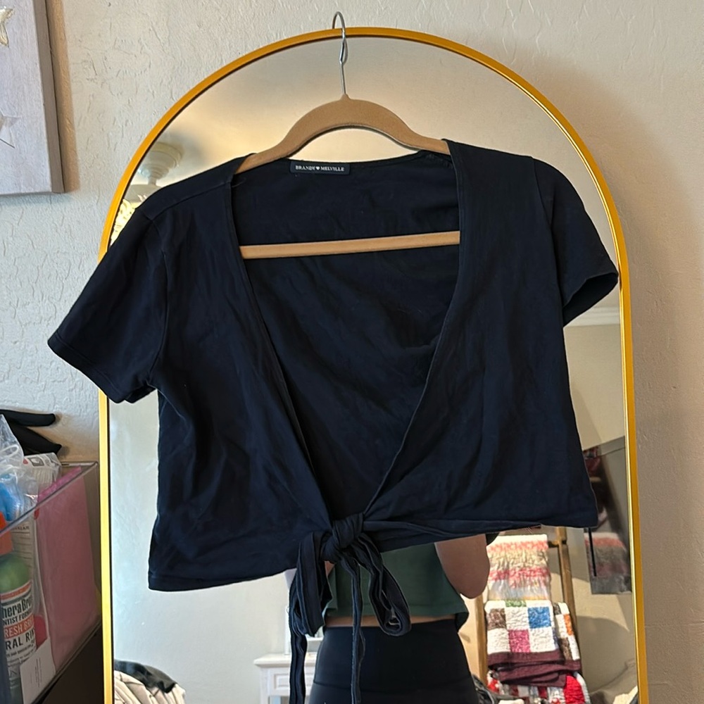 This is a black brandy Melville tie top